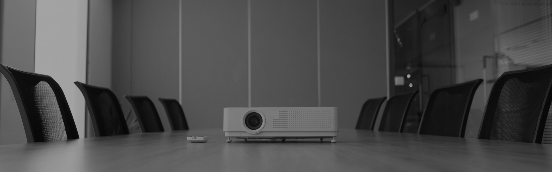 pan-shot-empty-office-with-projector-middle-conference-desk 1 (1)