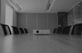 pan-shot-empty-office-with-projector-middle-conference-desk 1 (1)